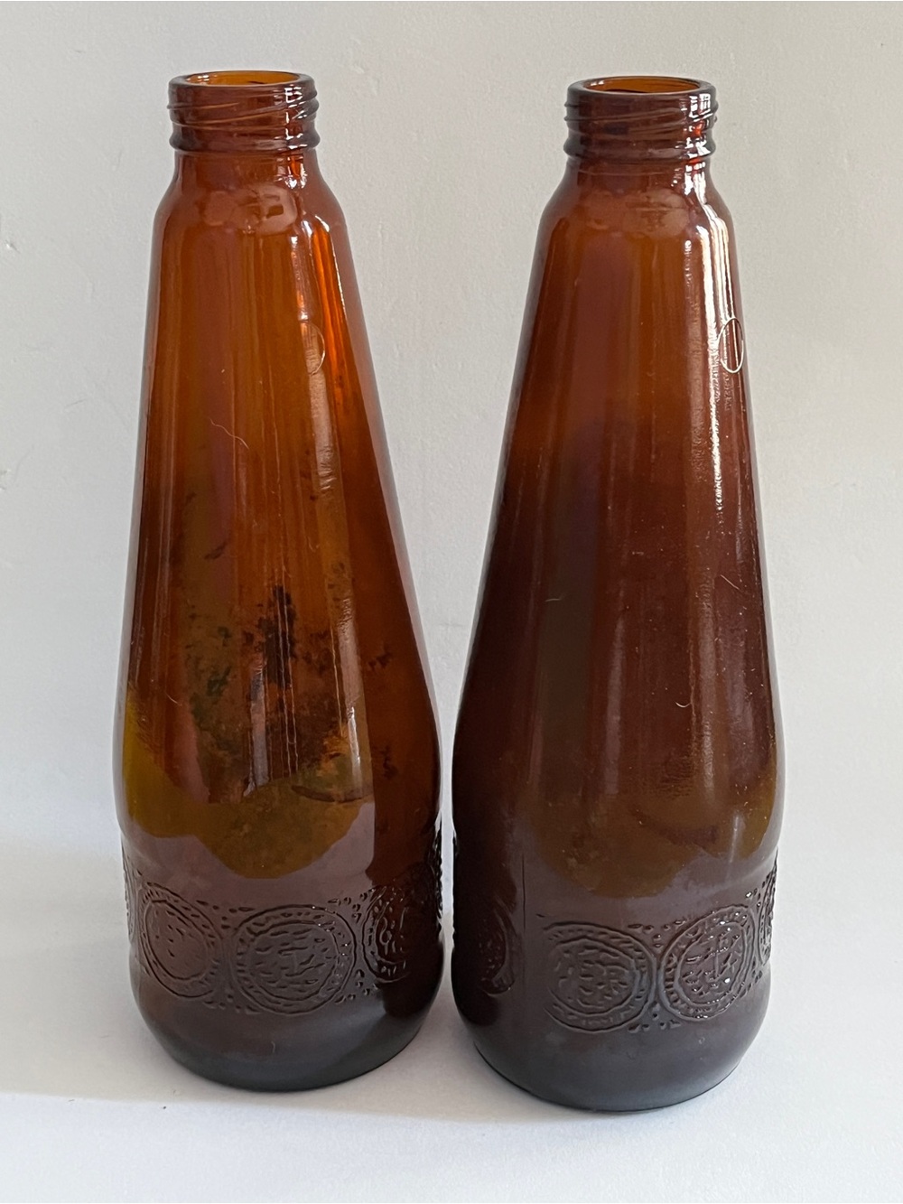 Vintage embossed Brown Amber Glass Decorative Bottles – Set of 2-